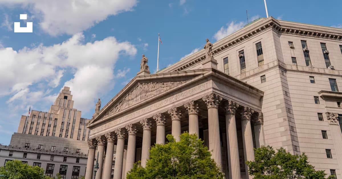 A classical courthouse building with columns, illustrating that ADA law, enforcement, and obligations remain in force